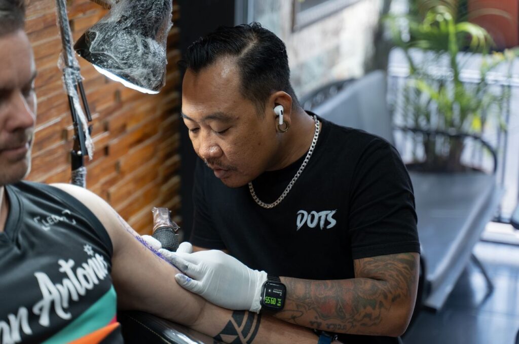 Junk Juz, cover-up, watercolor and color tattoo artist in Bali